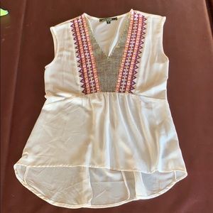 Love Stitch sleeveless high-low top